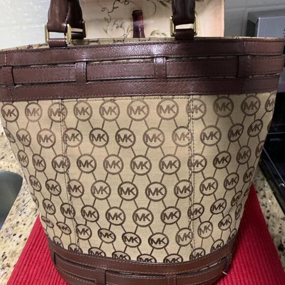 Michael Kor Canvas Monogram Bucket Handbag -Trimmed in Leather, Top Roll Handles - Picture 2 of 5